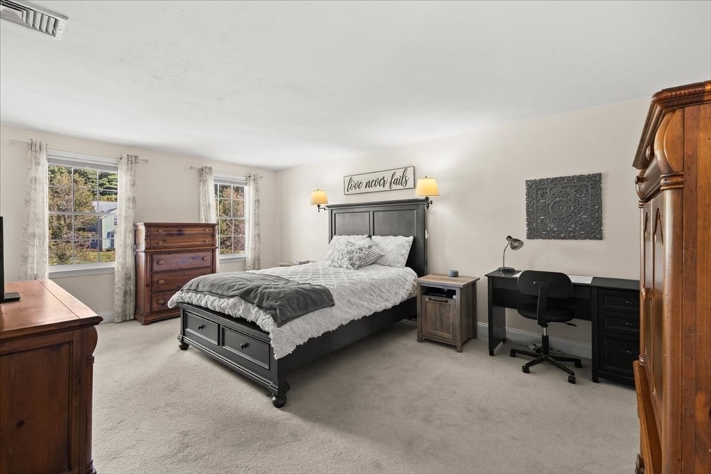 125 Independence Avenue Hanson, MA 02341 - Photo 16 of 42 a bedroom with a bed chair and dresser