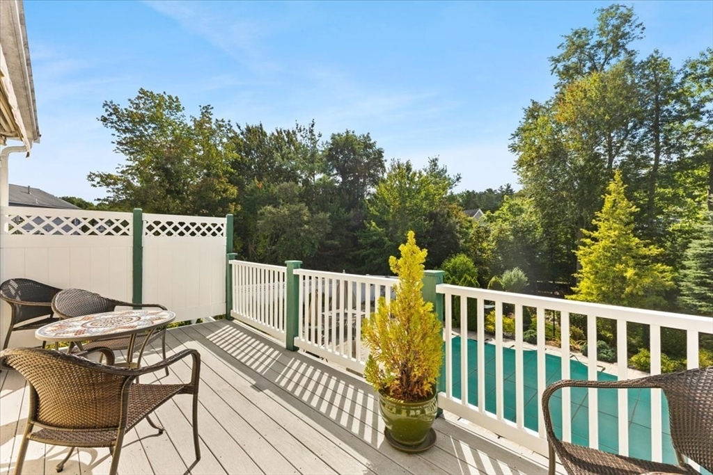 125 Independence Avenue Hanson, MA 02341 - Photo 31 of 42 a view of a chair and tables