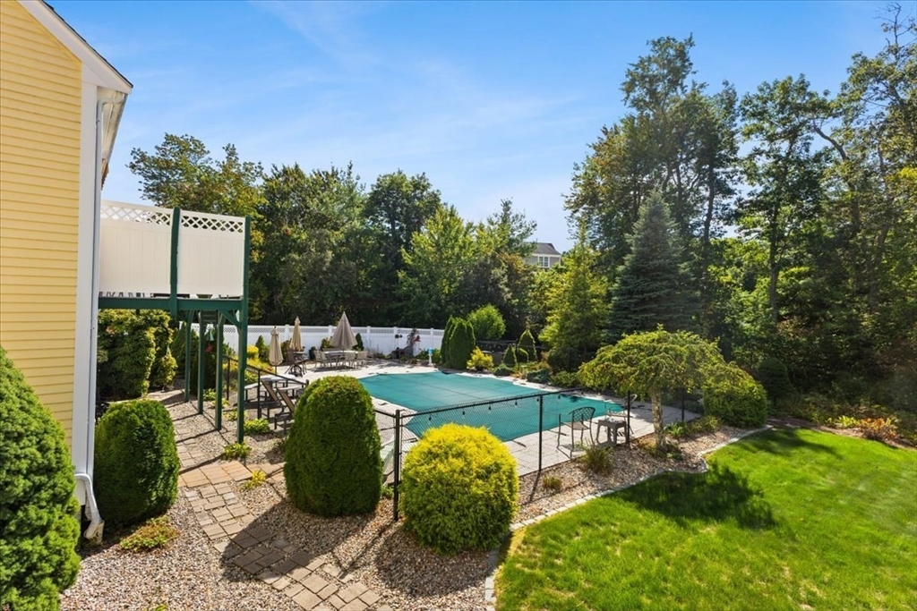 125 Independence Avenue Hanson, MA 02341 - Photo 32 of 42 a view of a backyard with sitting area