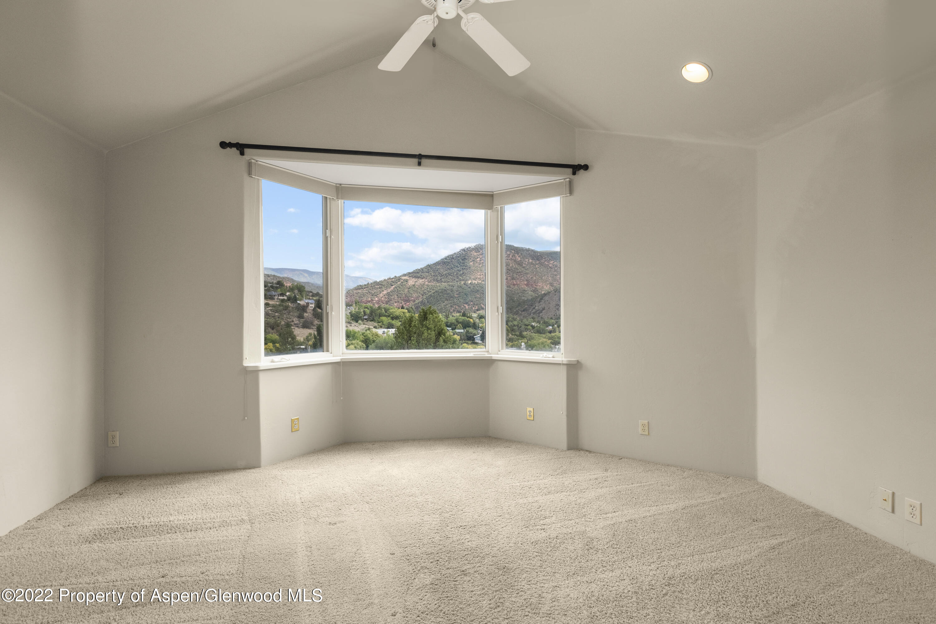306 Wild Spring Lane Basalt, CO 81621 - Photo 8 of 11 a view of an empty room with a window