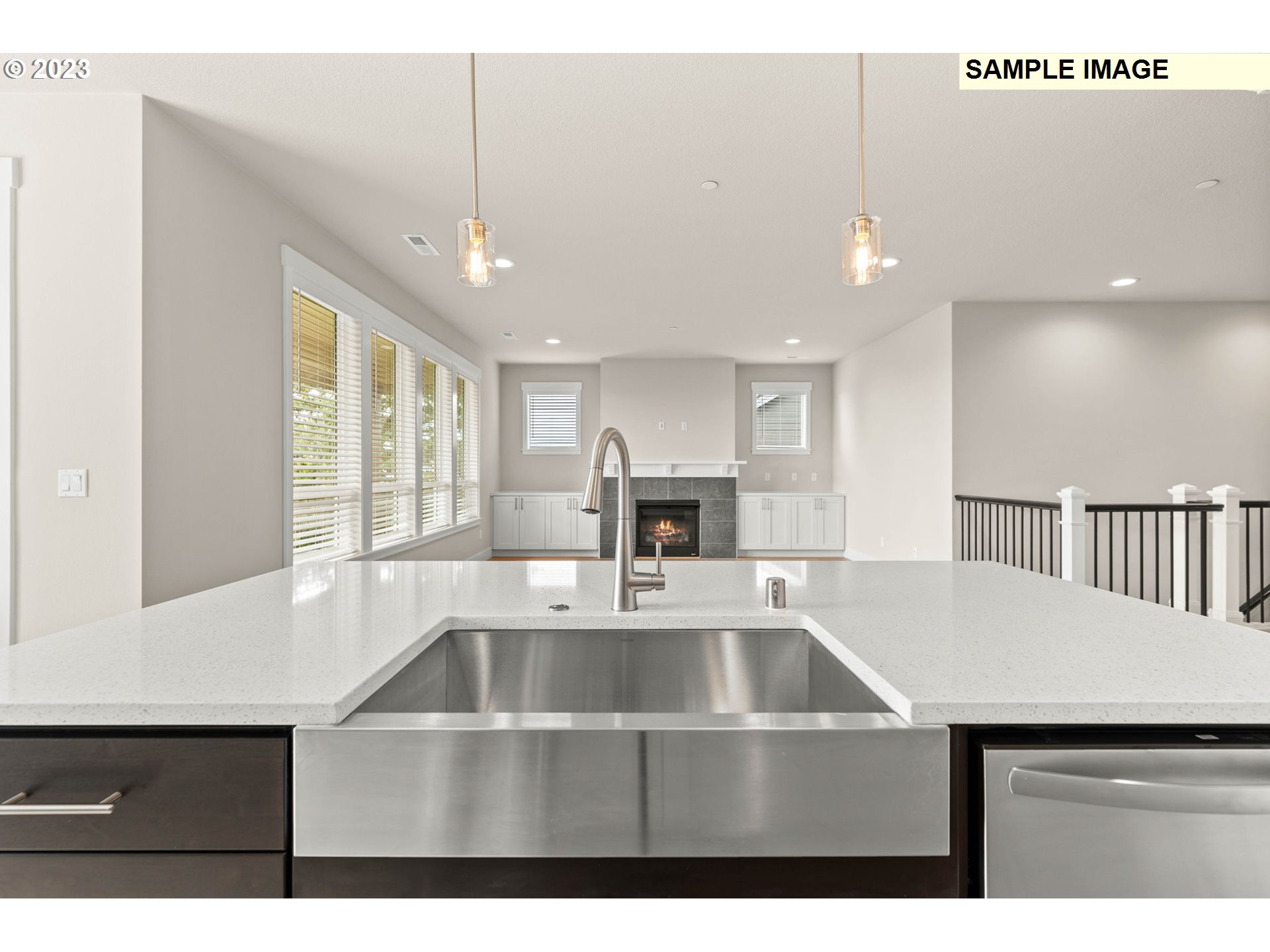 5482 North 94th Avenue, Unit LT213 Camas, WA 98607 - Photo 13 of 39 a kitchen with a sink a counter top space and cabinets