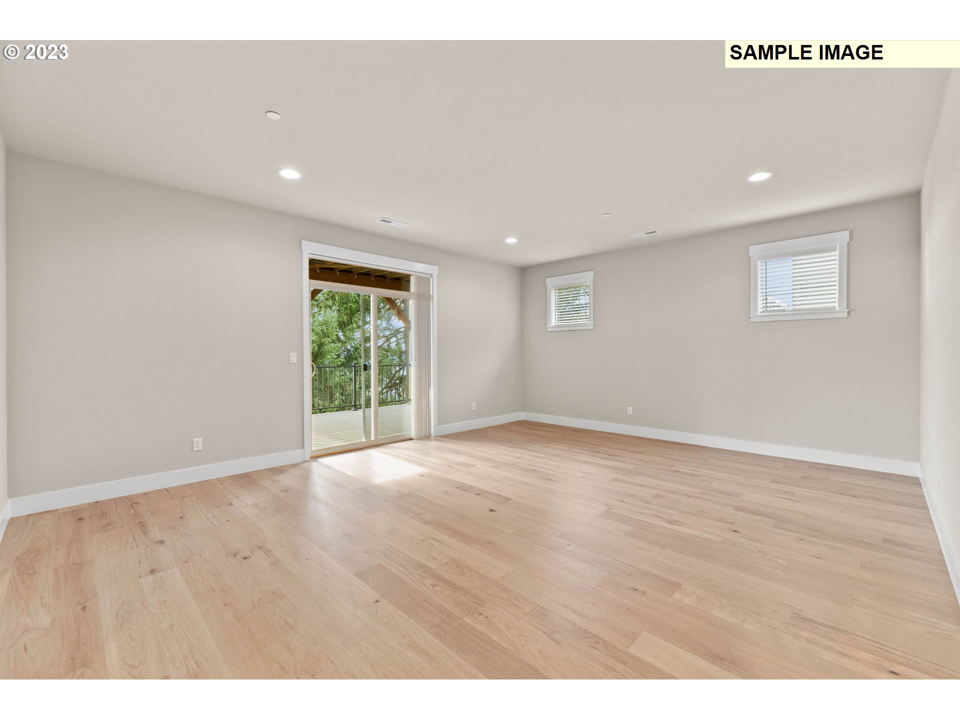5482 North 94th Avenue, Unit LT213 Camas, WA 98607 - Photo 18 of 39 a view of an empty room with wooden floor and window