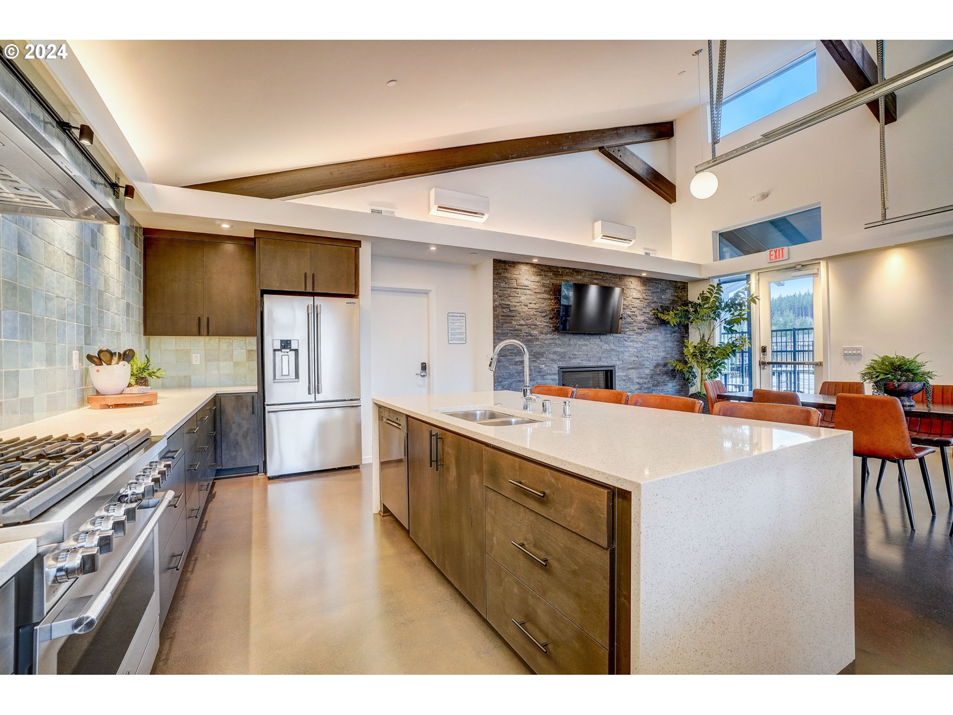 5482 North 94th Avenue, Unit LT213 Camas, WA 98607 - Photo 35 of 39 a kitchen with stainless steel appliances kitchen island granite countertop a sink cabinets and wooden floor