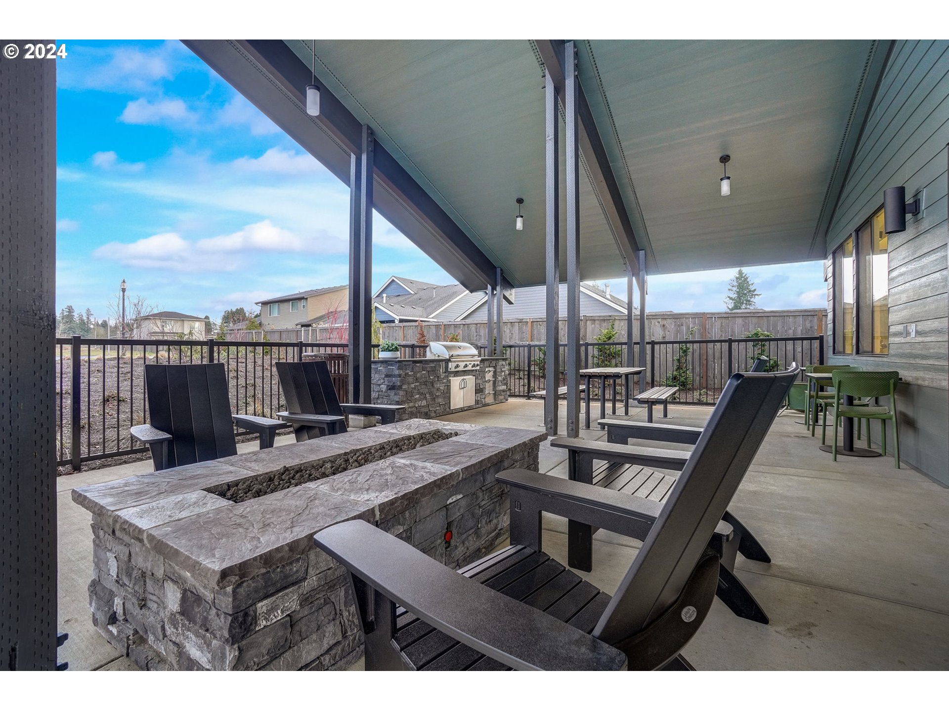 5482 North 94th Avenue, Unit LT213 Camas, WA 98607 - Photo 37 of 39 a view of a patio with a table and chairs
