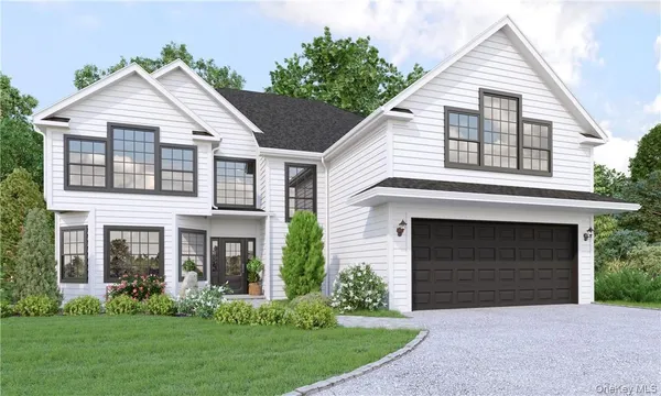 front view of a house and a yard