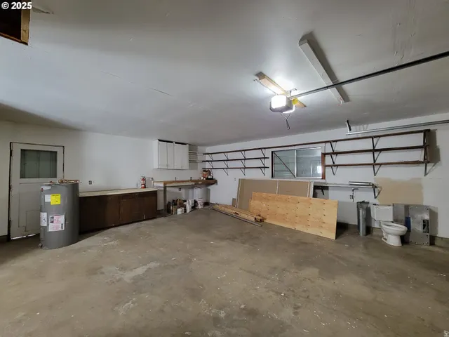 a bed room with a bed and furniture