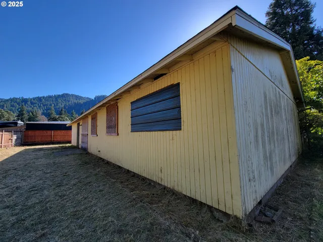 a backyard of a house with lots of green space