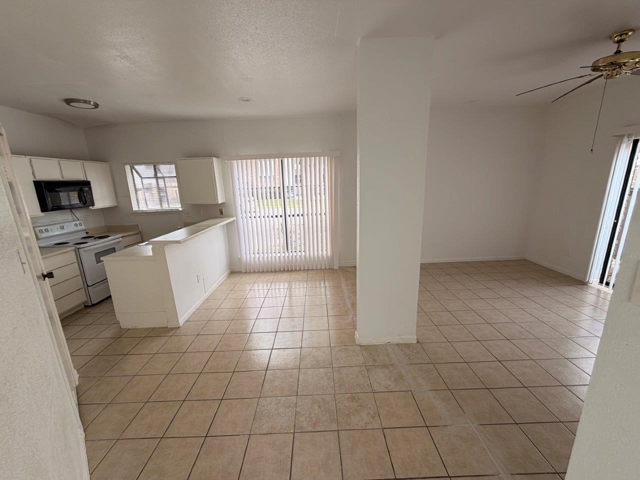 7901 Cambridge Street, Unit 25 Houston, TX 77054 - Photo 1 of 18 a view of an empty room with a window