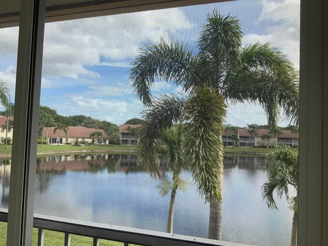 a view of a lake from a balcony