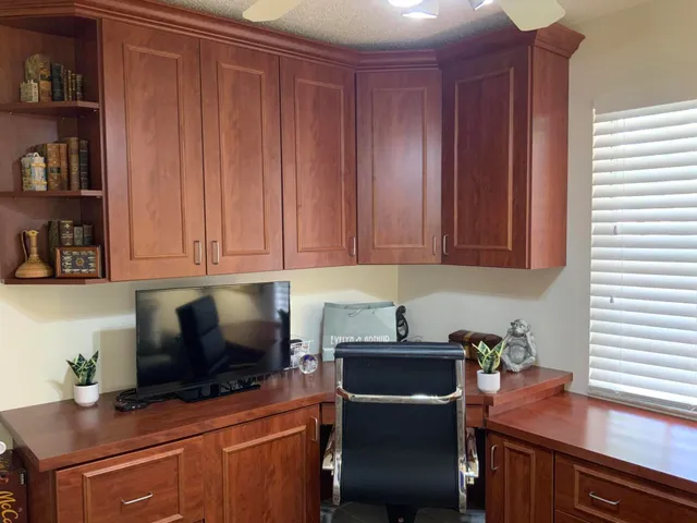 a room with furniture and wooden floor