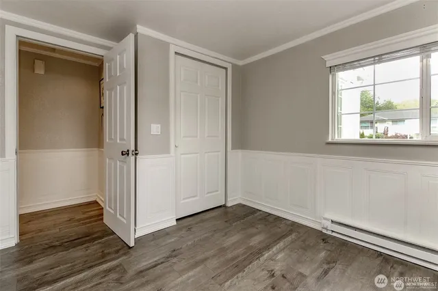 a bathroom with a shower a sink and a mirror