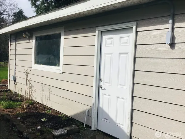 a house view with a garden space
