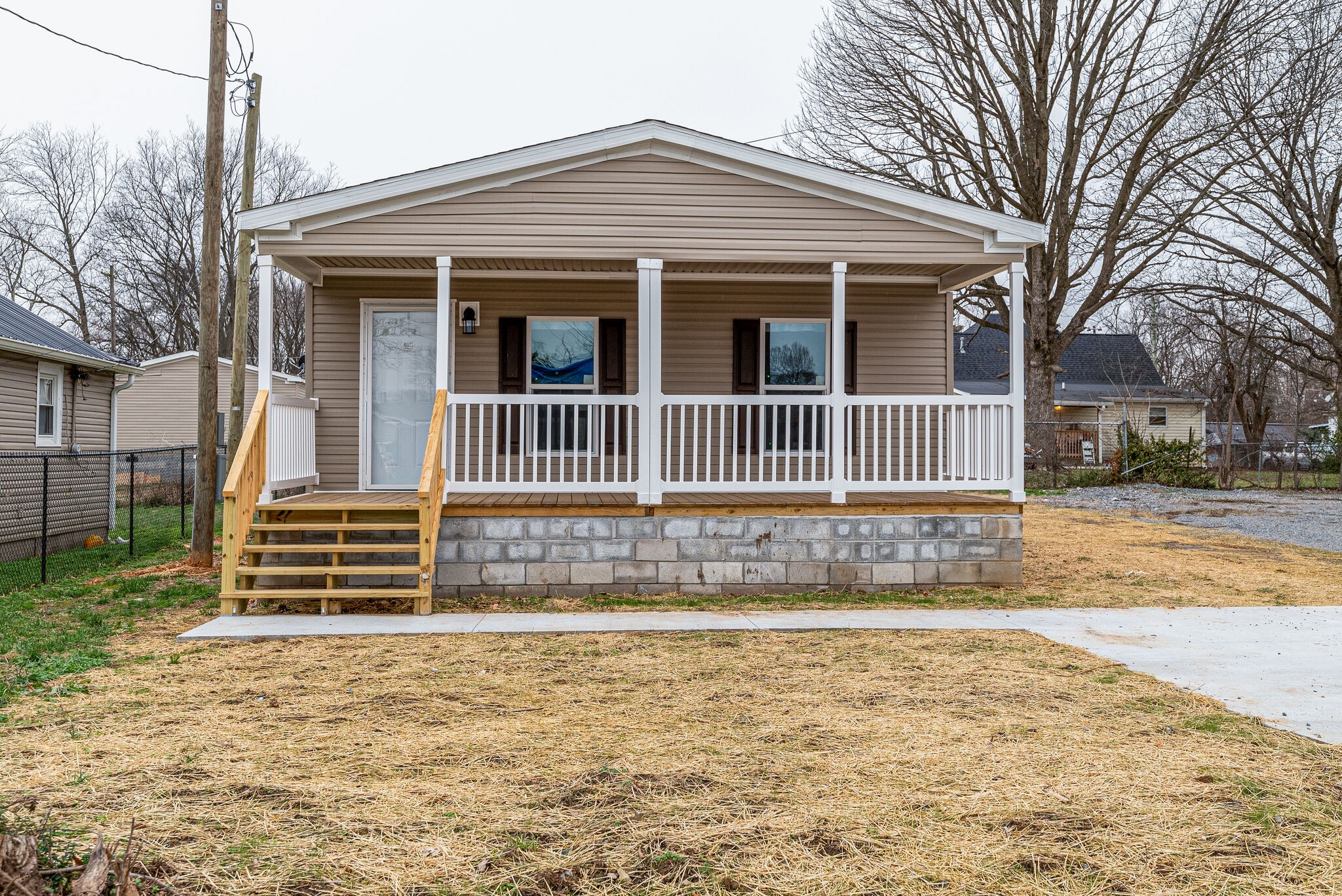 1321 Parham Street Springfield, TN 37172 - Photo 1 of 21 a front view of a house with a garden