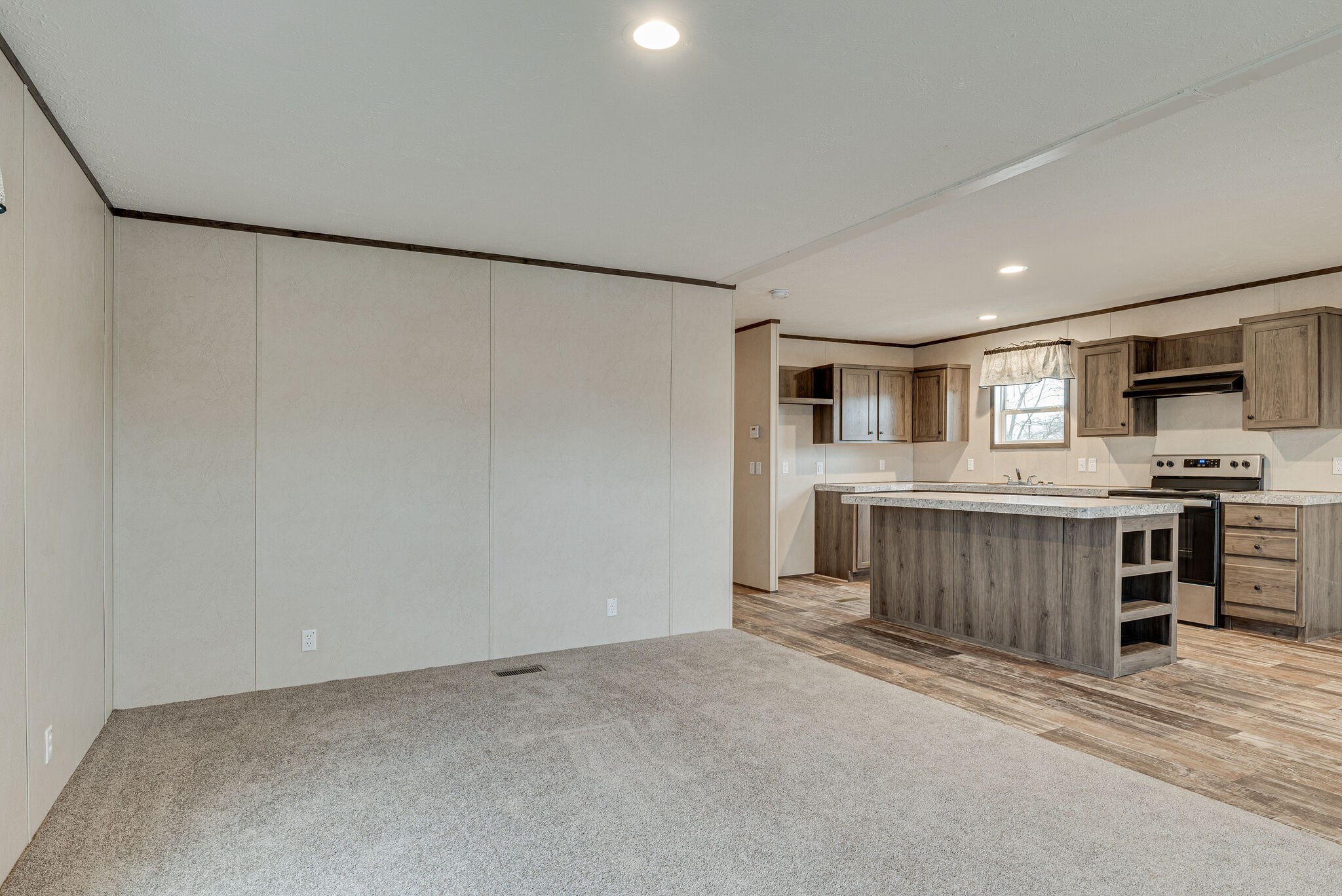 1321 Parham Street Springfield, TN 37172 - Photo 3 of 21 a living room with stainless steel appliances kitchen island granite countertop a refrigerator oven a sink with wooden cabinets and floors