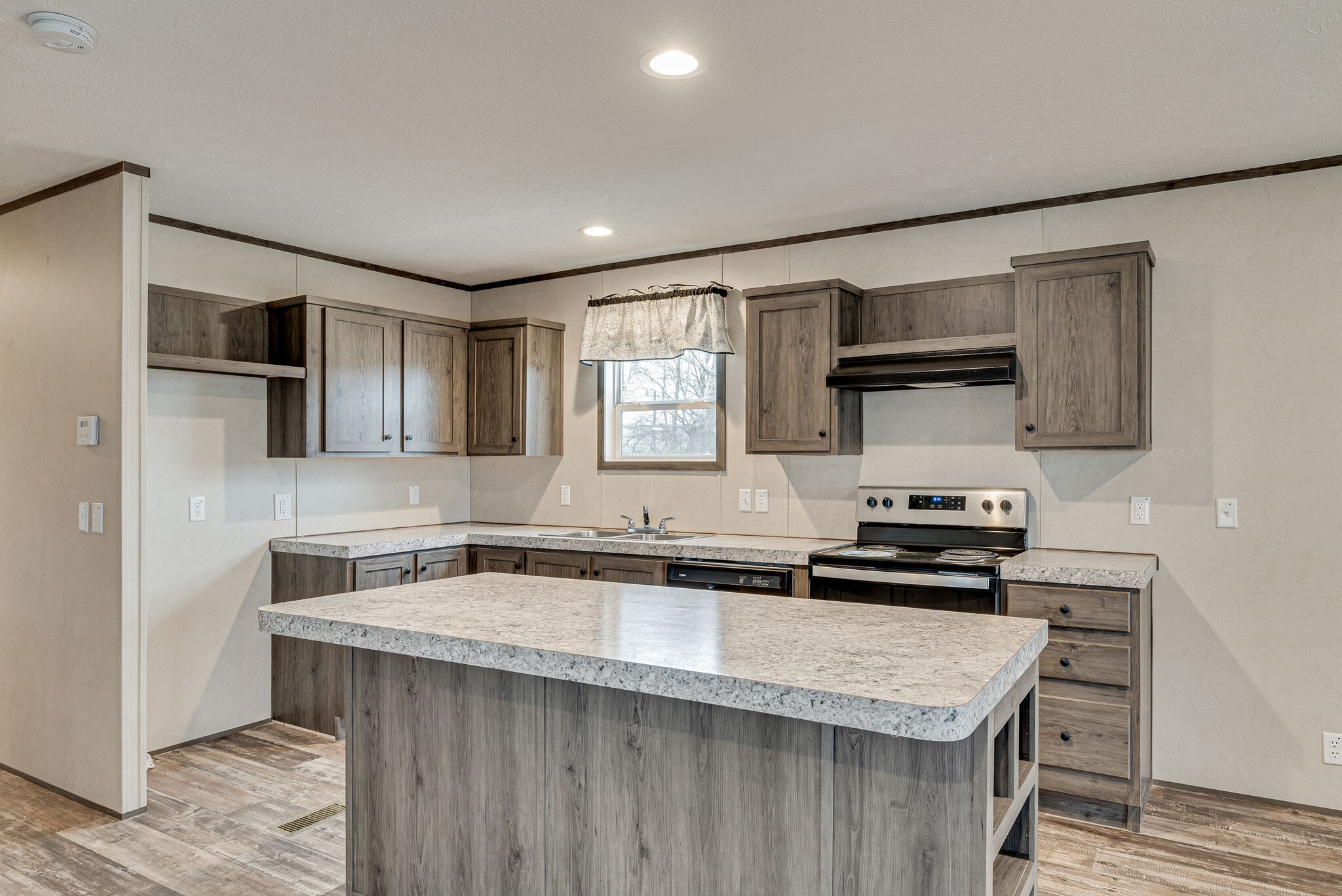 1321 Parham Street Springfield, TN 37172 - Photo 6 of 21 a kitchen that has a sink a microwave a stove and cabinets