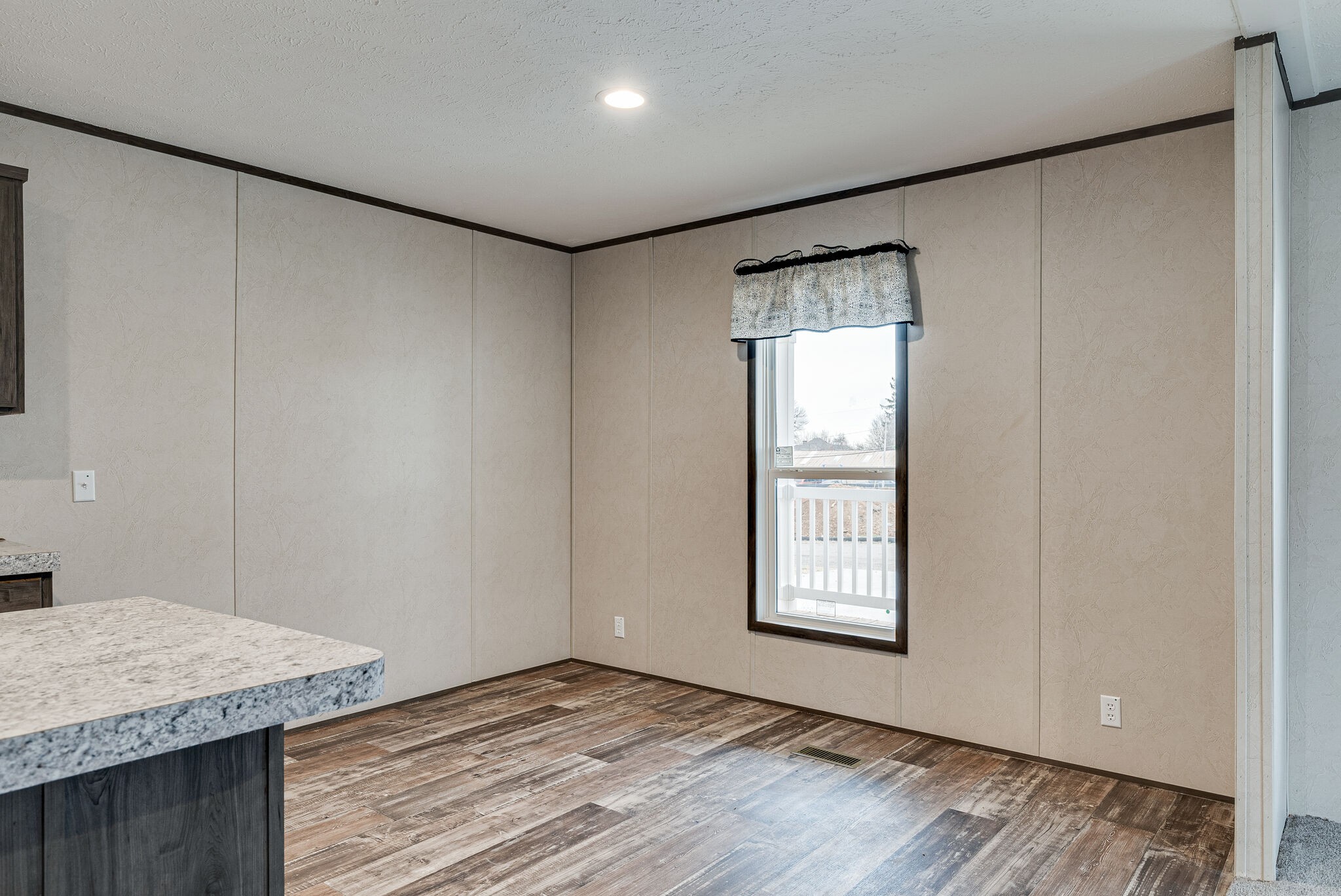 1321 Parham Street Springfield, TN 37172 - Photo 9 of 21 a view of an empty room with window and wooden floor