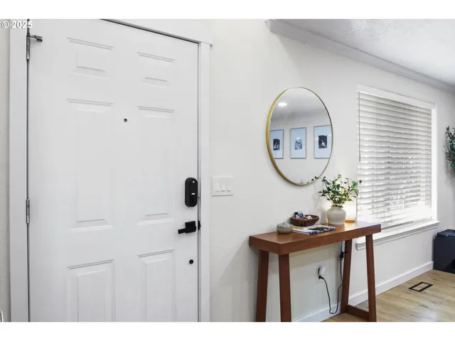 a bathroom with a sink a mirror and a window