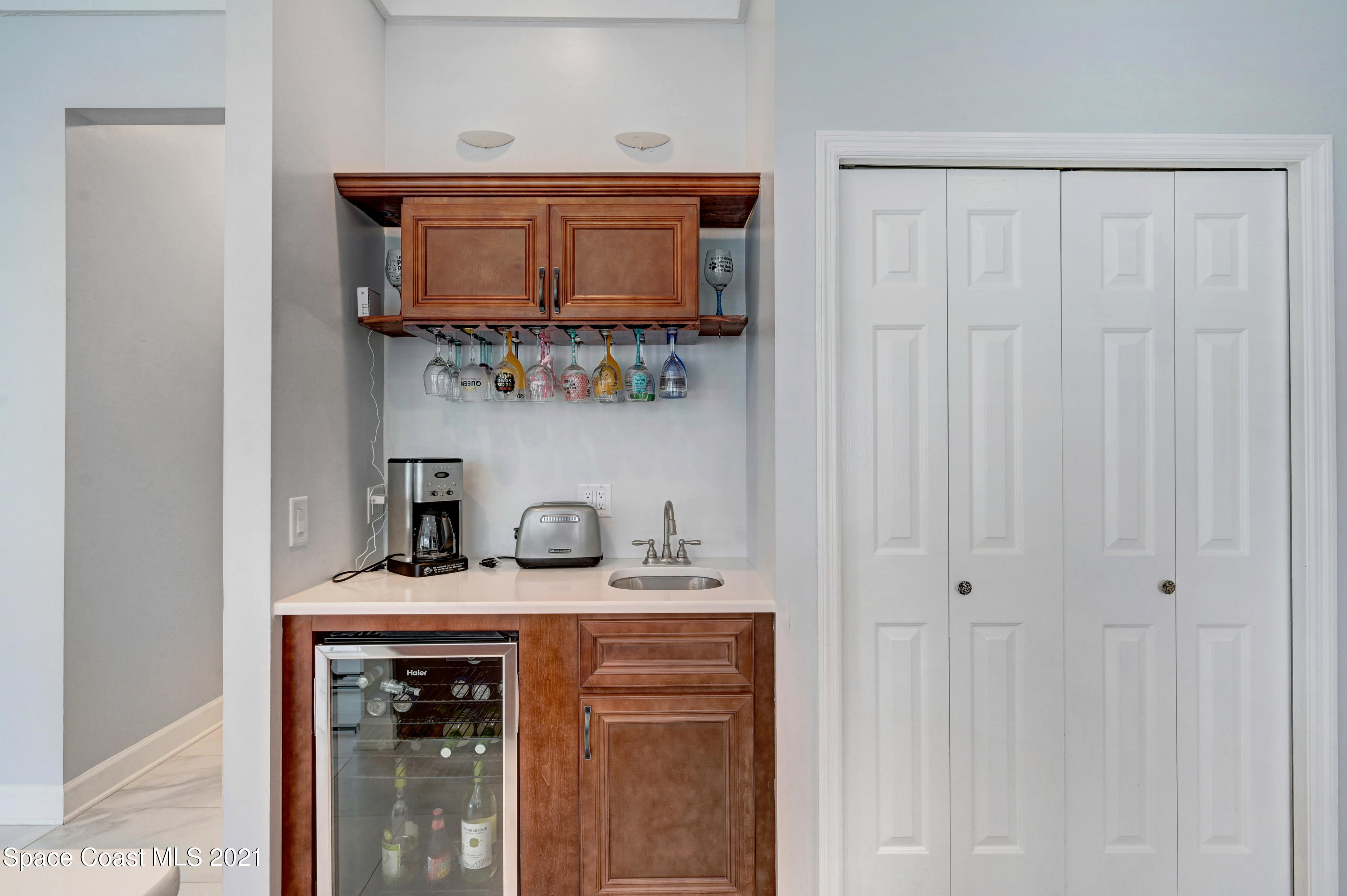 4601 Indian River Drive Cocoa, FL 32927 - Photo 20 of 51 a bathroom with a sink and a mirror