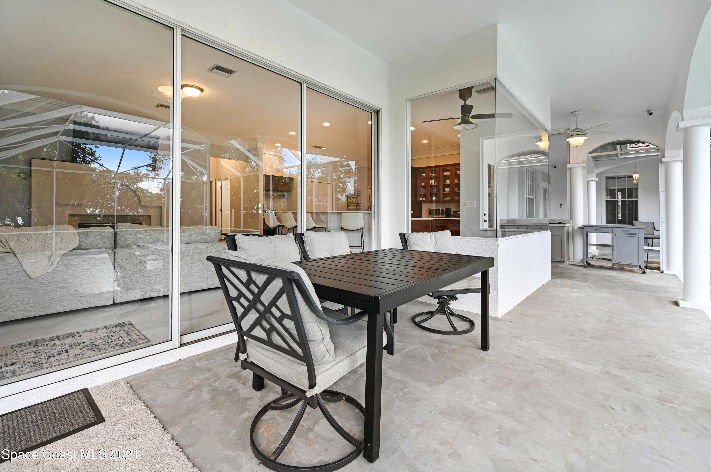 4601 Indian River Drive Cocoa, FL 32927 - Photo 42 of 51 a dining room with furniture and wooden floor