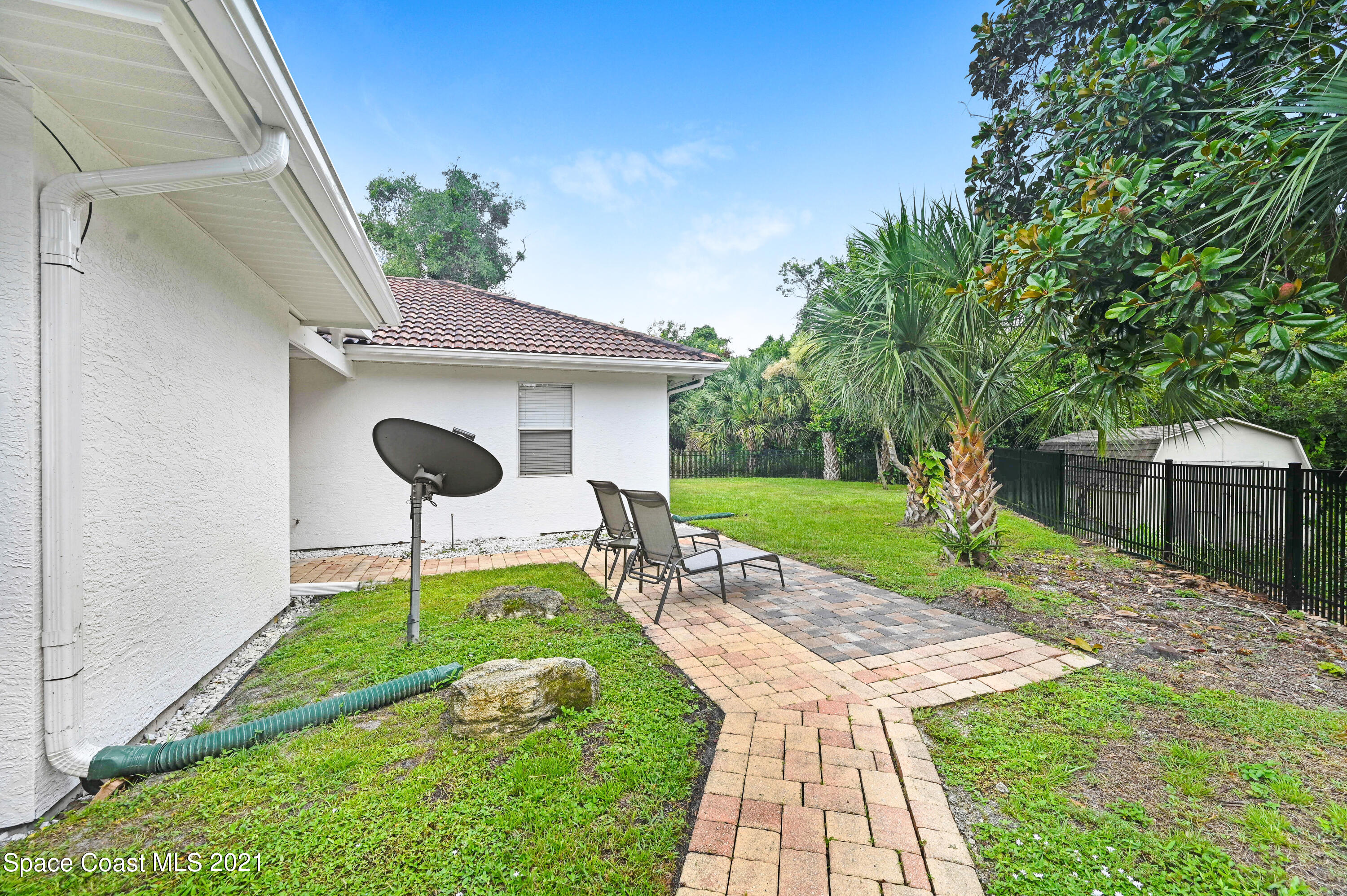 4601 Indian River Drive Cocoa, FL 32927 - Photo 46 of 51 a front view of a house with a yard