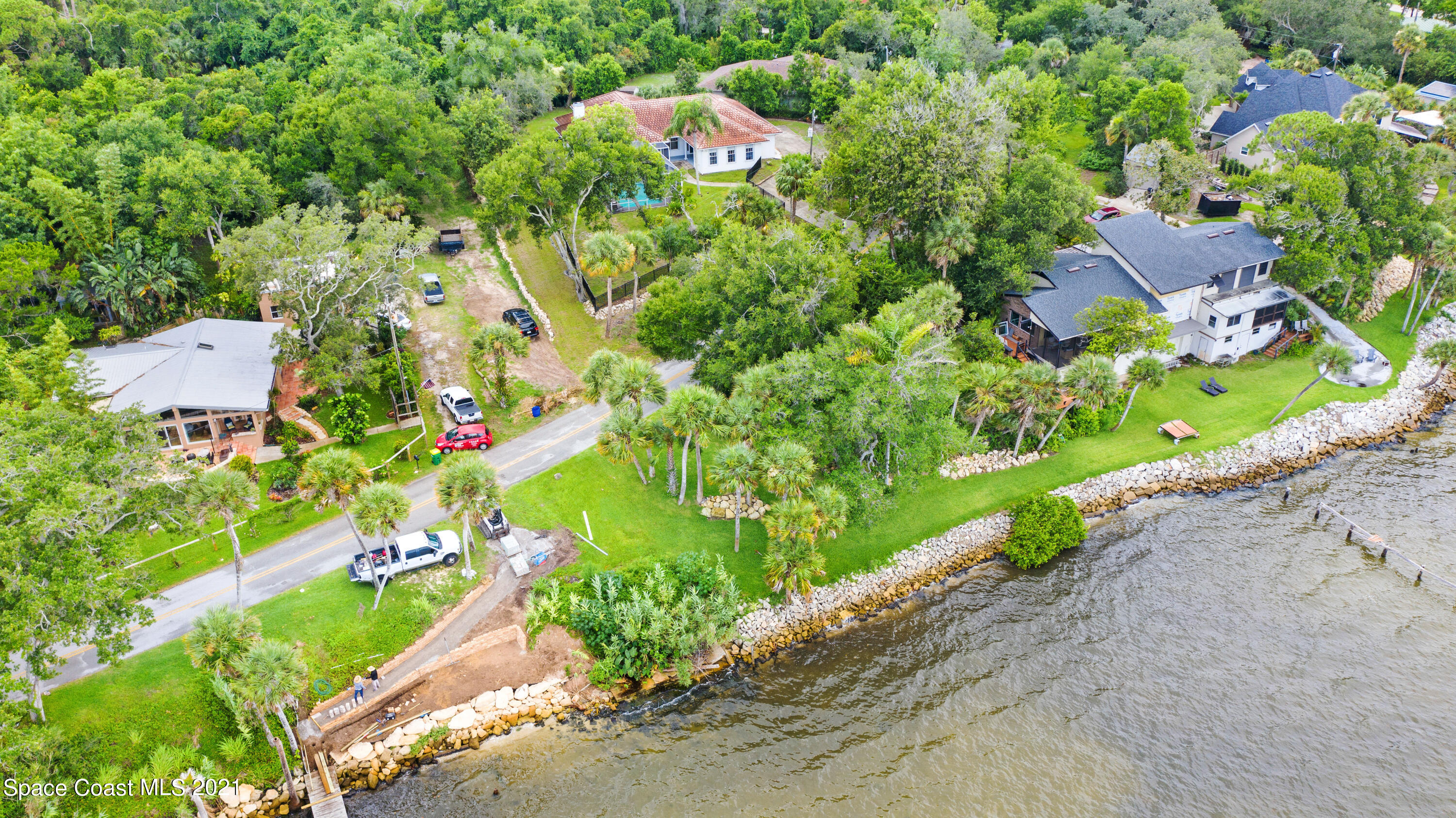 4601 Indian River Drive Cocoa, FL 32927 - Photo 8 of 51 an aerial view of residential houses with outdoor space and street view