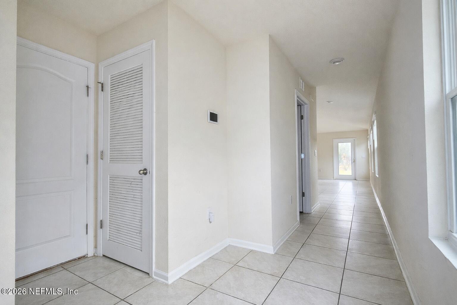 86226 Mainline Road Yulee, FL 32097 - Photo 3 of 22 a view of a hallway