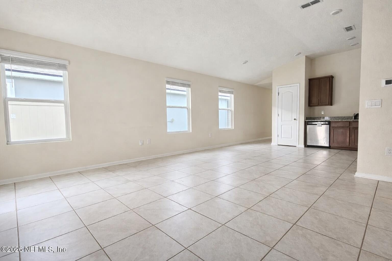 86226 Mainline Road Yulee, FL 32097 - Photo 7 of 22 a view of a livingroom with furniture window and a fireplace