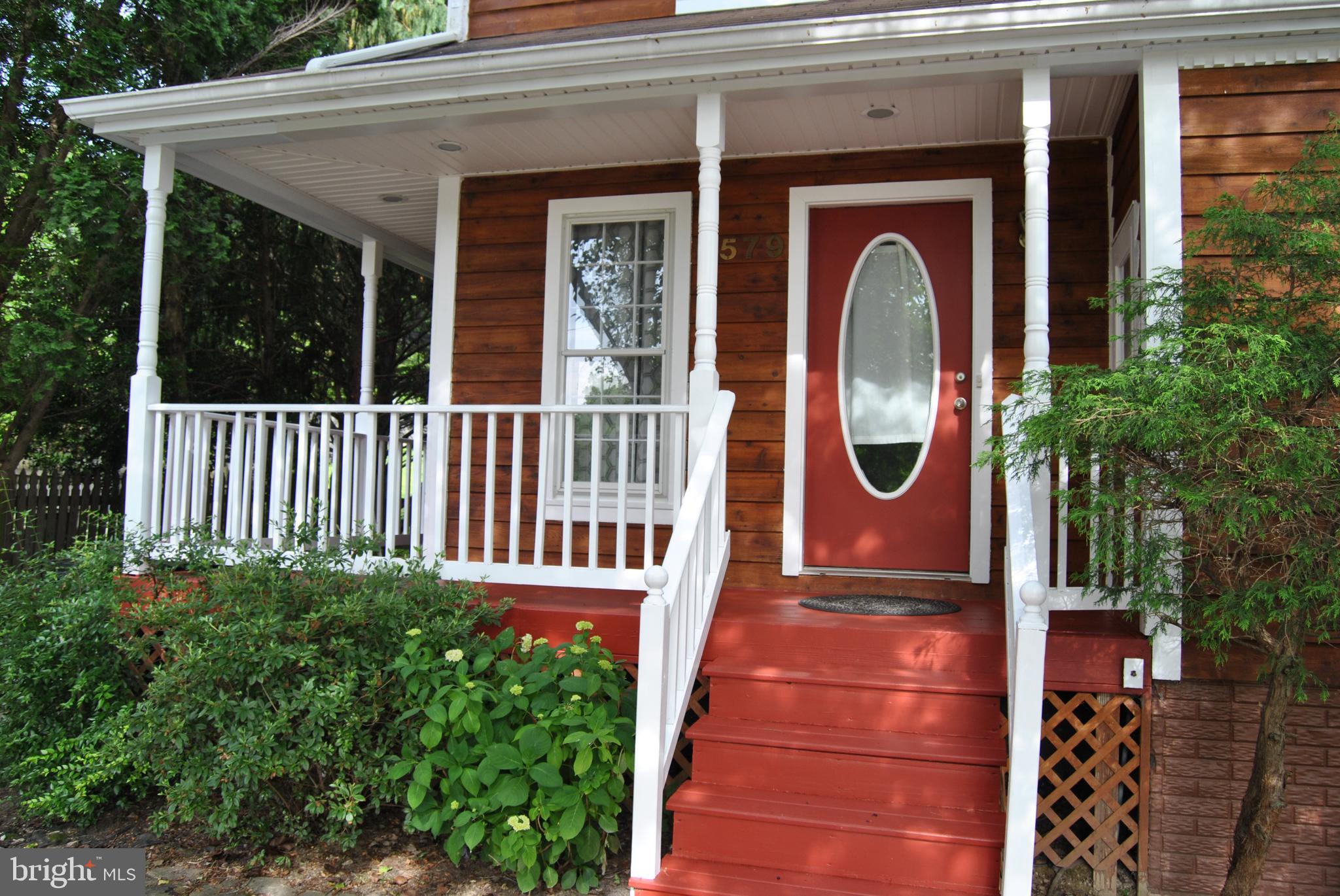 So pretty! Porch rails/floor/ceiling just redone.