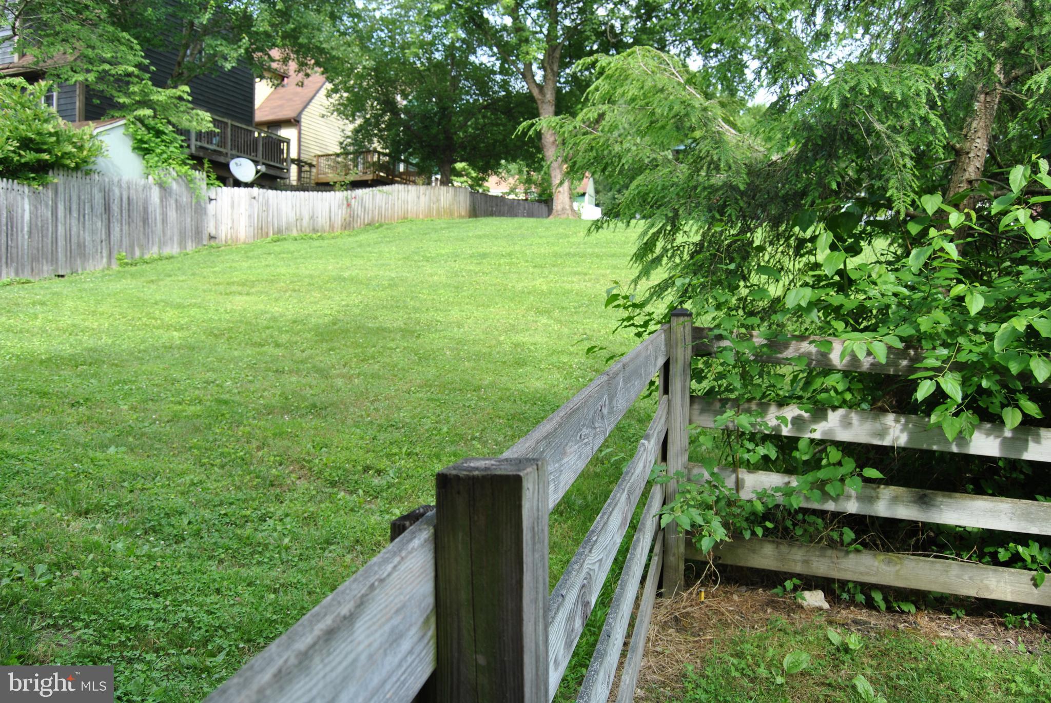6579 Hemlock Point Road New Market, MD 21774 - Photo 17 of 18 Even green space to the side of the house!!!