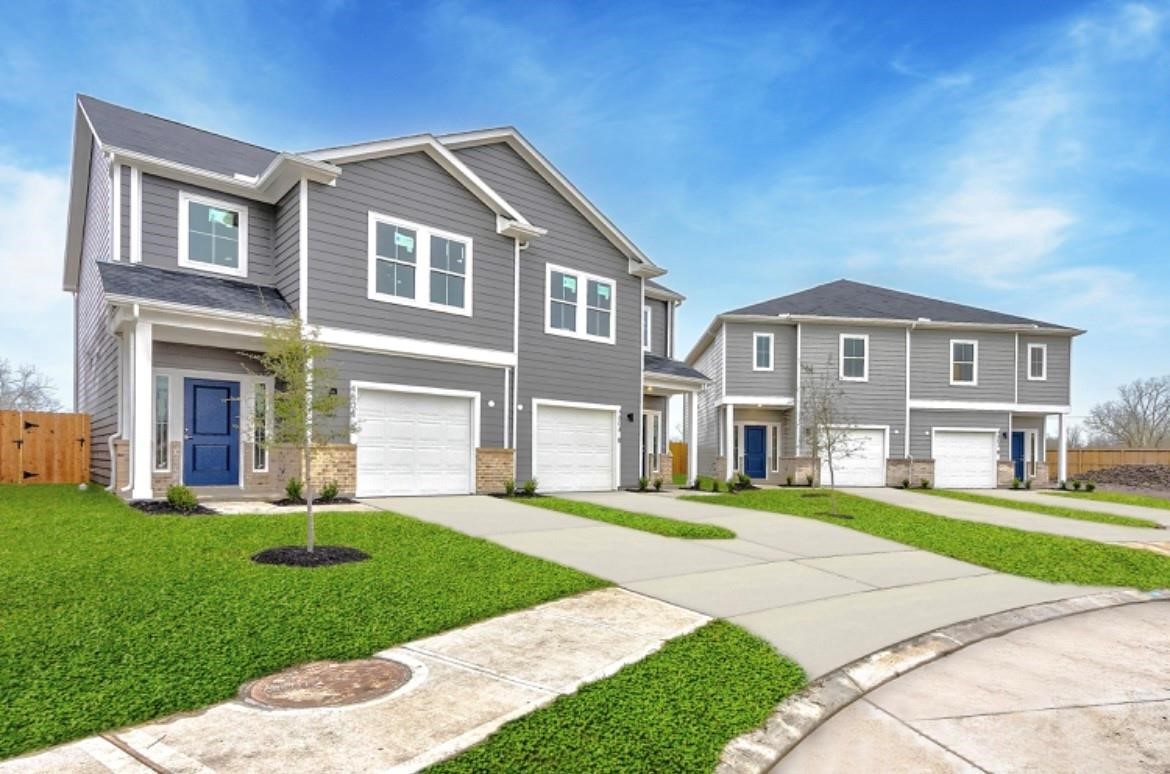 4806 Centipede Road, Unit A Houston, TX 77048 - Photo 1 of 19 a front view of a house with a yard and trees