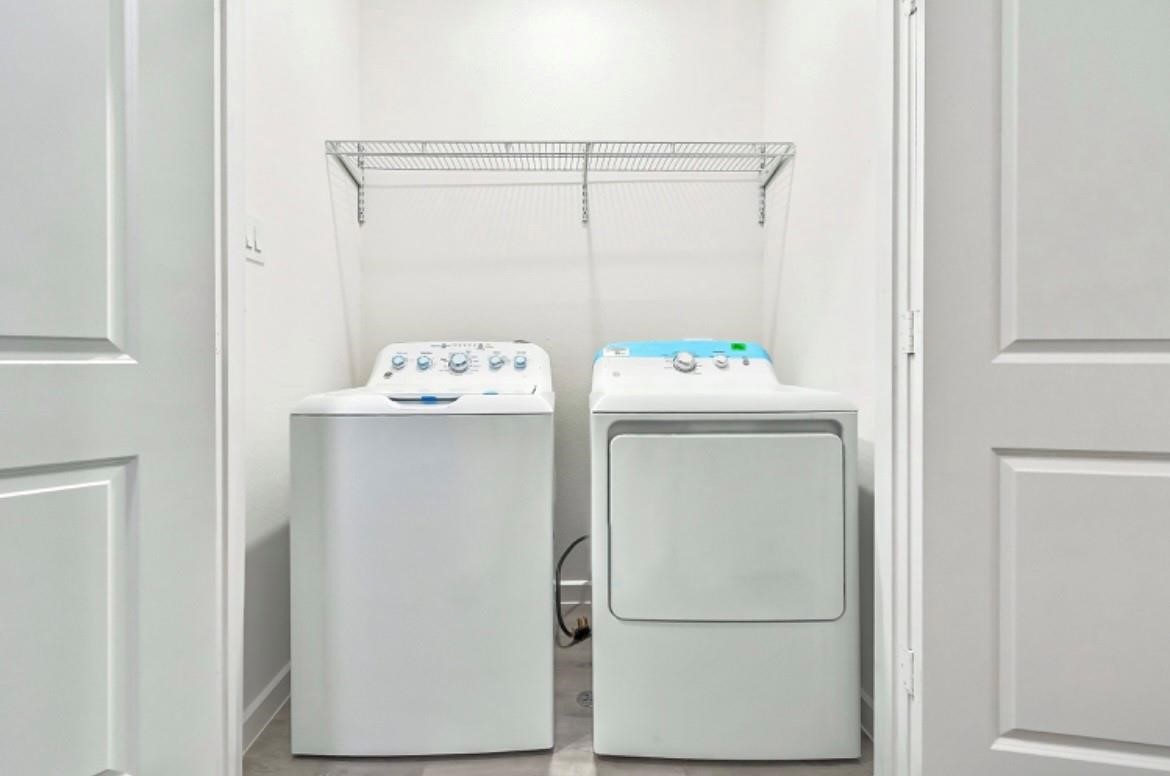 4806 Centipede Road, Unit A Houston, TX 77048 - Photo 16 of 19 a utility room with dryer and washer