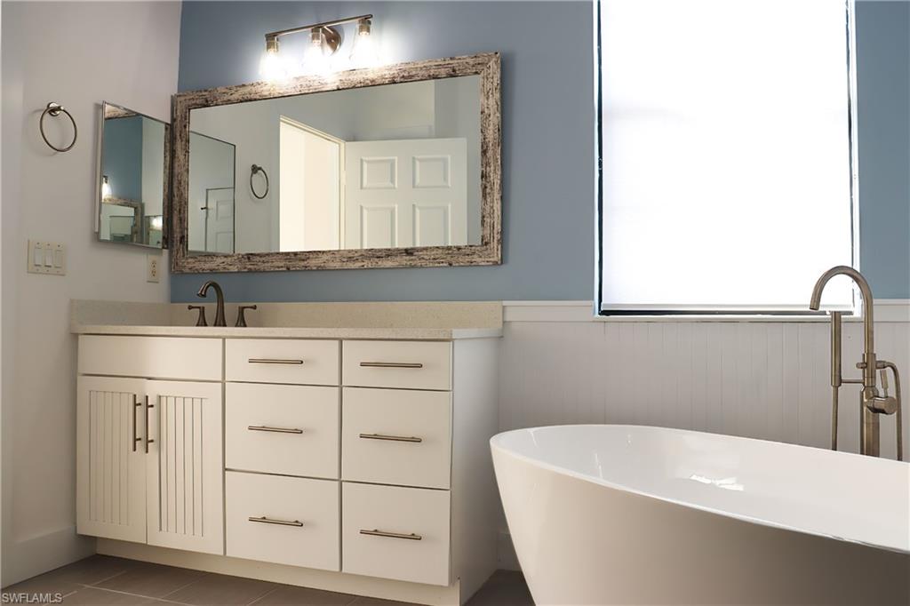 15489 Summit Pl Circle, Unit 302 Naples, FL 34119 - Photo 13 of 25 Spa like primary bathroom
