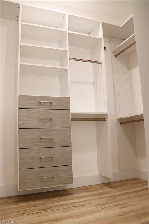15489 Summit Pl Circle, Unit 302 Naples, FL 34119 - Photo 15 of 25 Custom California Closet