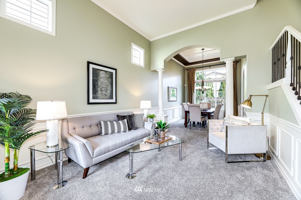 21303 37th Avenue Southeast Bothell, WA 98021 - Photo 2 of 34 a living room with furniture and a large window