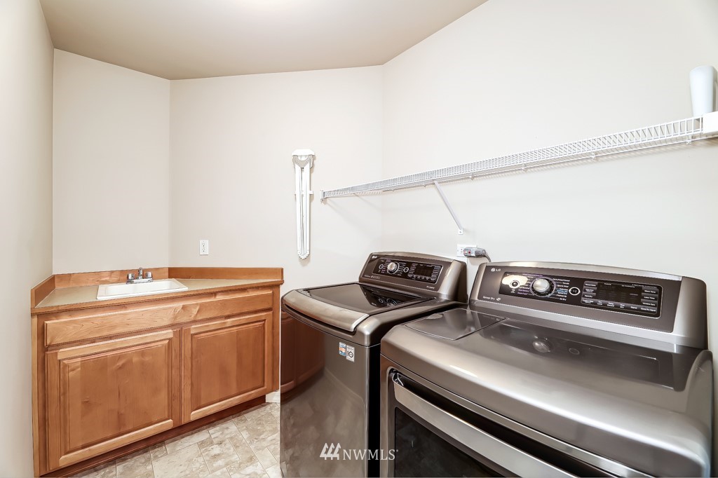 21303 37th Avenue Southeast Bothell, WA 98021 - Photo 25 of 34 a utility room with dryer and washer