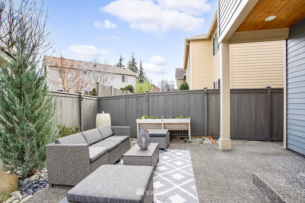 21303 37th Avenue Southeast Bothell, WA 98021 - Photo 28 of 34 a outdoor living space with furniture and city view