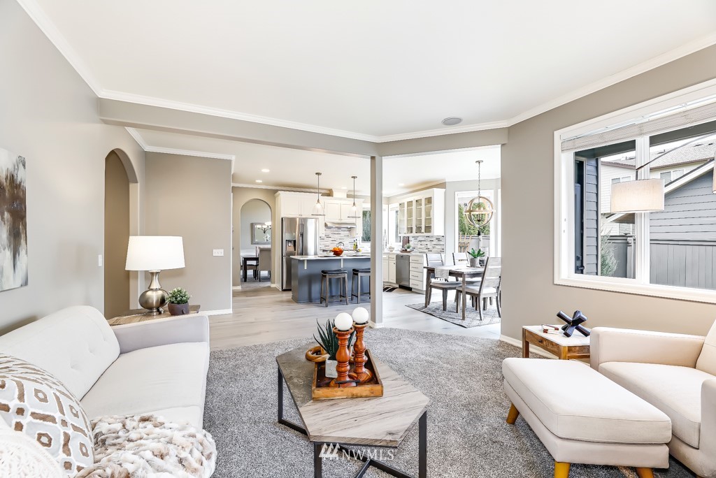 21303 37th Avenue Southeast Bothell, WA 98021 - Photo 9 of 34 a living room with furniture and a large window