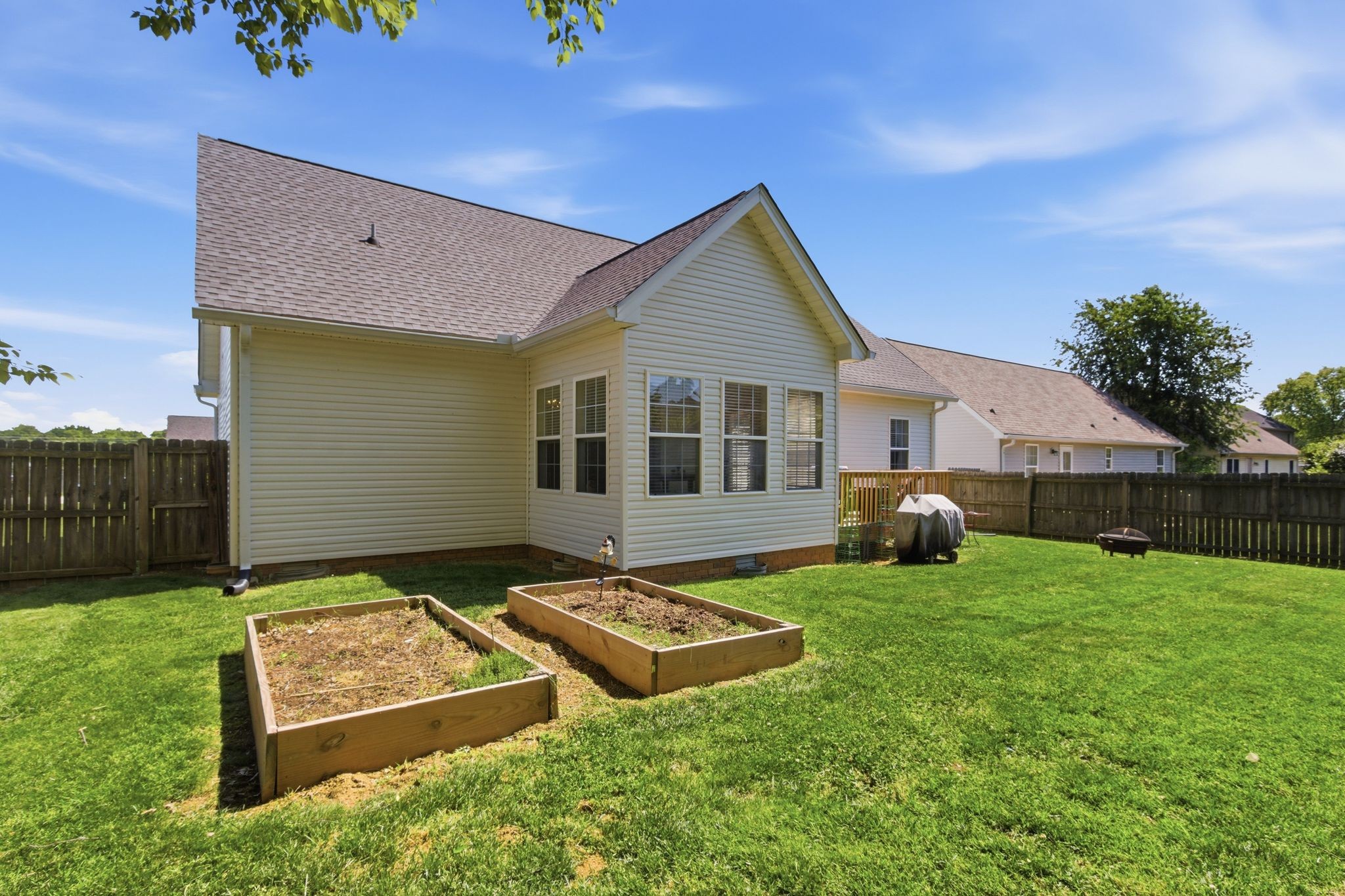 1503 Chapman Lane Spring Hill, TN 37174 - Photo 33 of 33 a view of a house with backyard and porch