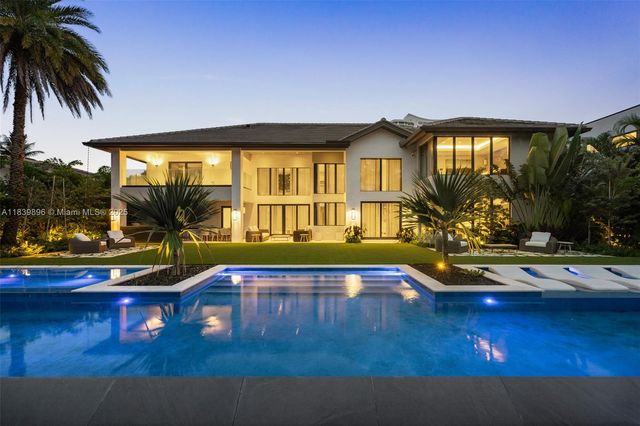 a view of a house with swimming pool