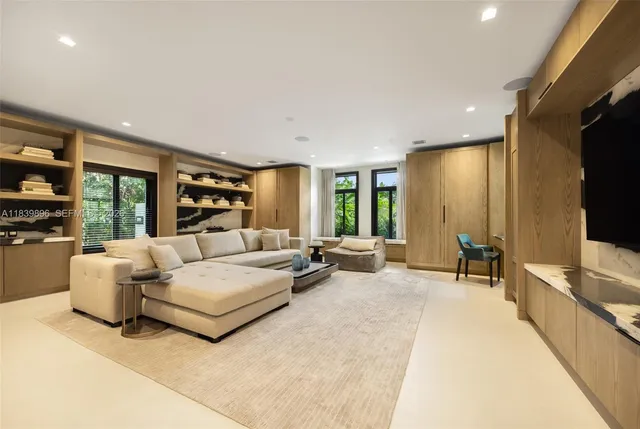 an entryway with wooden floor