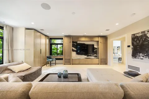 an entryway with wooden floor