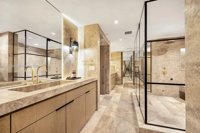 a bed room with a bed and a chair