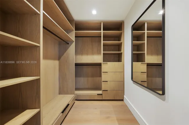 a view of a lake with sitting area