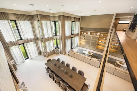 a view of a swimming pool with a garden and plants