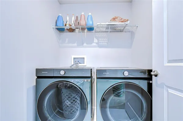 a view of a living room and floor to ceiling window