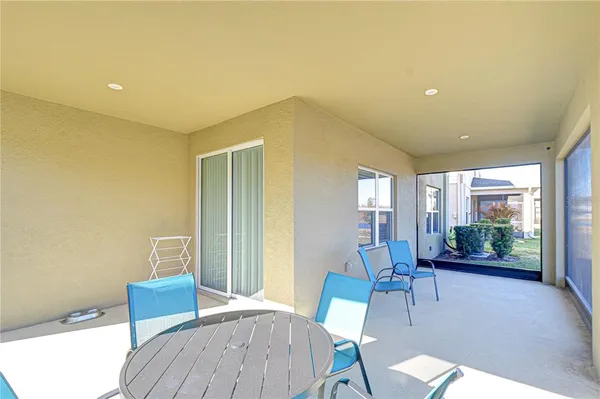 a view of swimming pool with outdoor space and seating area