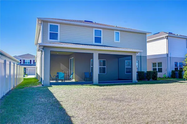 a view of outdoor space with playground and mountain view