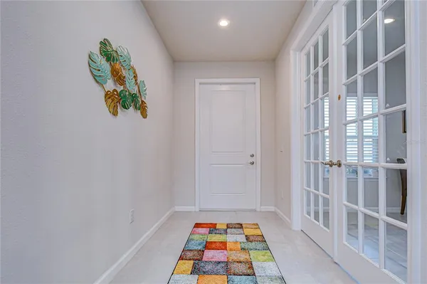 a room with lounge chair and couch
