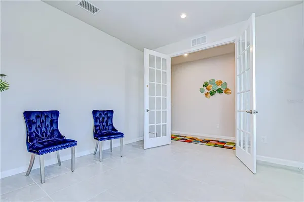 a living room with furniture and a couch