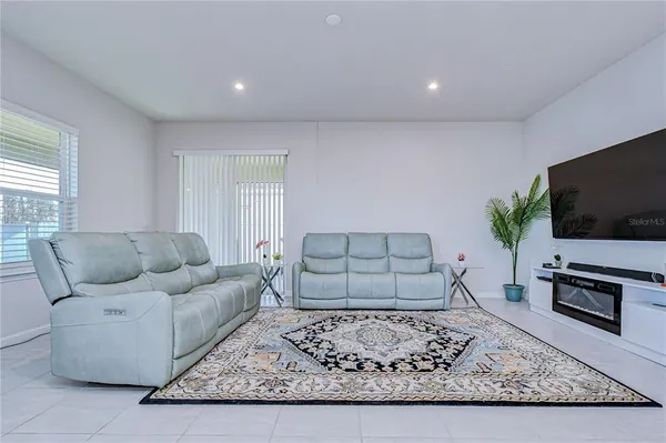 a living room with furniture and a couch